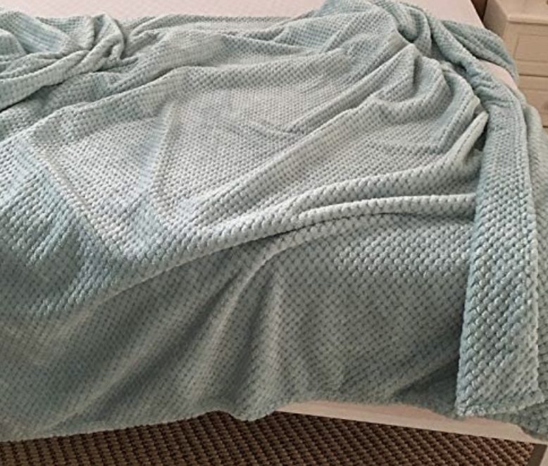 80% off Super Soft Throw Blankets – Just $2.60 shipped!